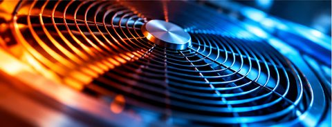Close-up of an air conditioning condenser fan.